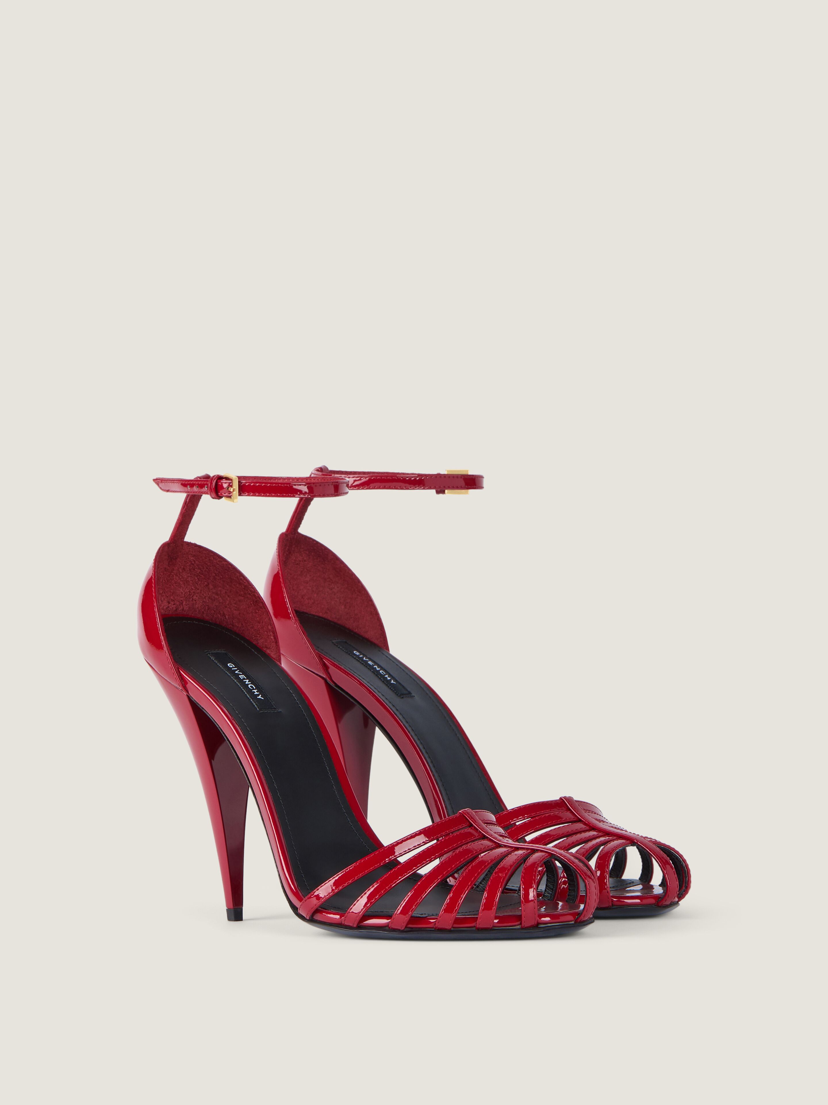 Cage heeled sandals in patent leather